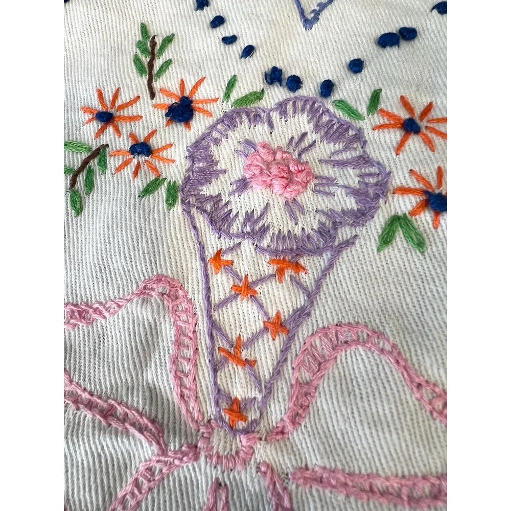 Two embroidered doilies crochet edge lace hearts linens